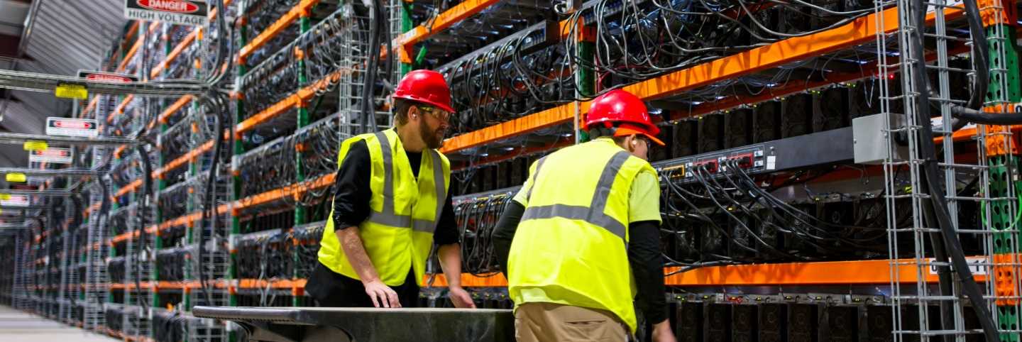 Engineers working at a data center