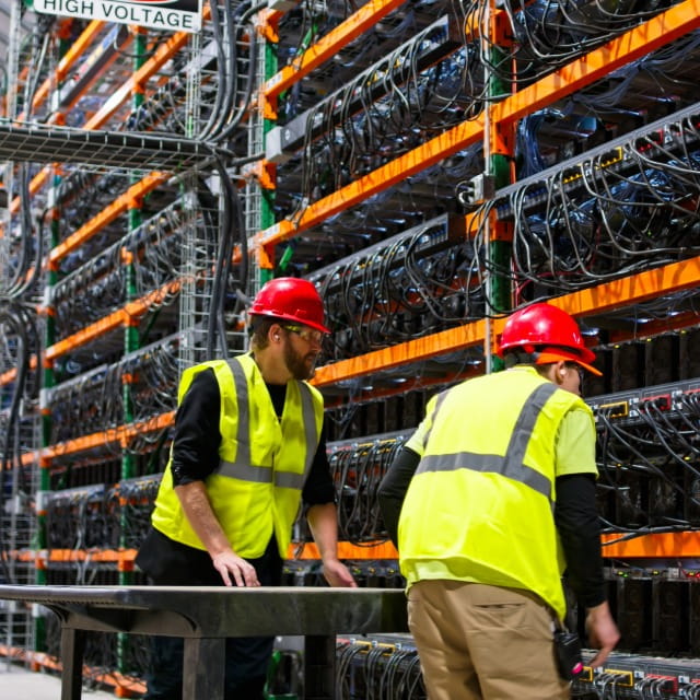 Engineers working at a data center