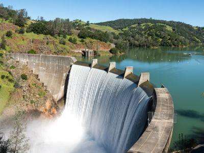picture of a dam with water flowing