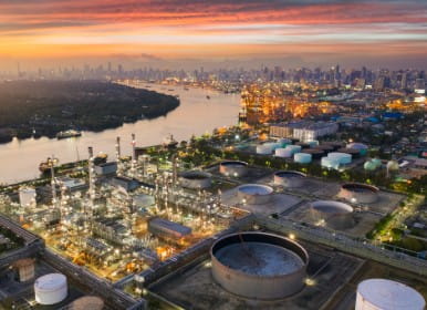 Aerial view of oil refinery near city