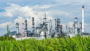 oil refining plant with grass in the foreground