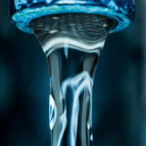 A tap running with water